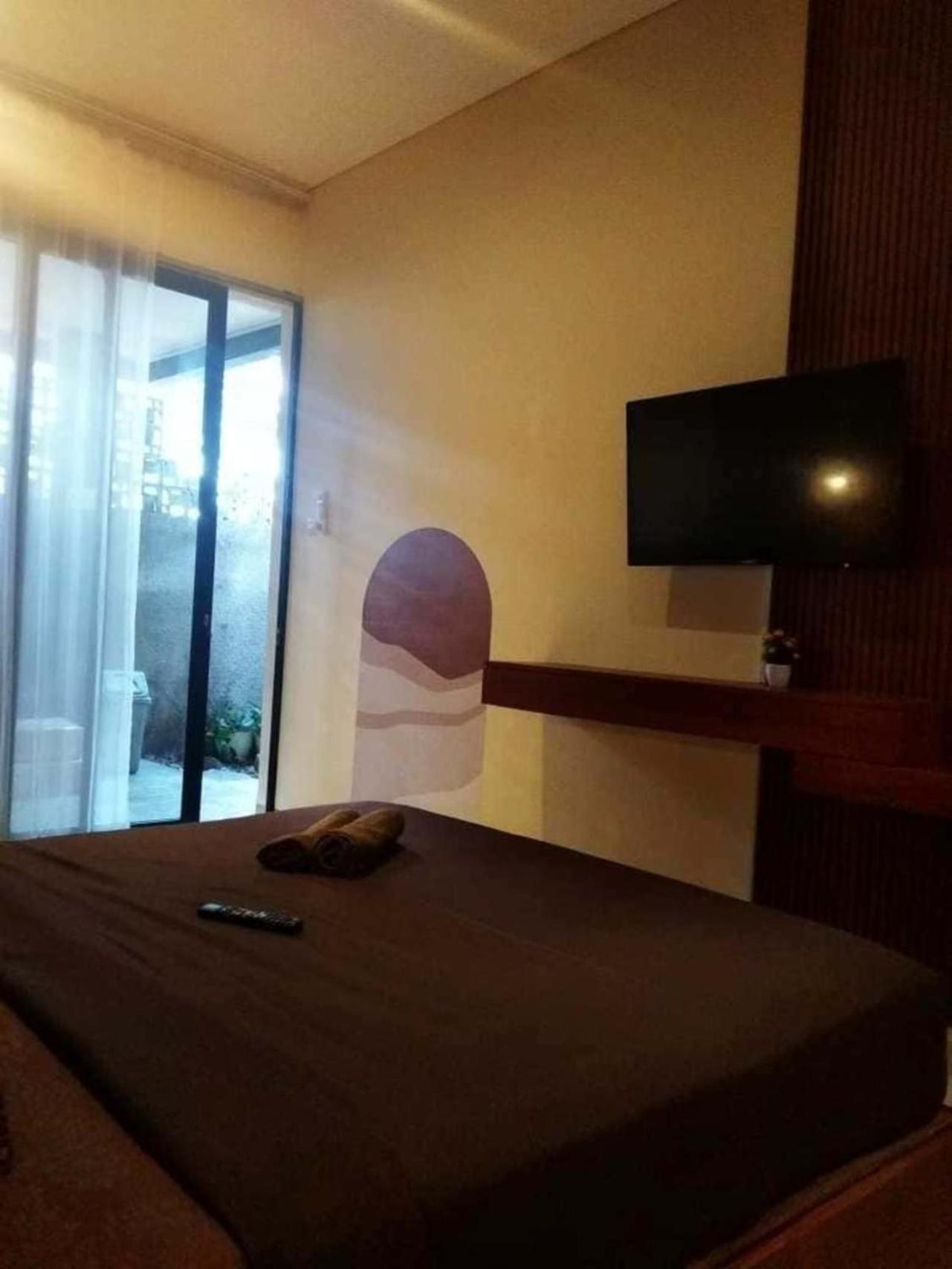 Escotel Casa De Luga Jakarta Exteriör bild